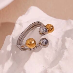 Elegant Two-Tone Silver and Gold Ring
Adjustable 
Stainless Steel